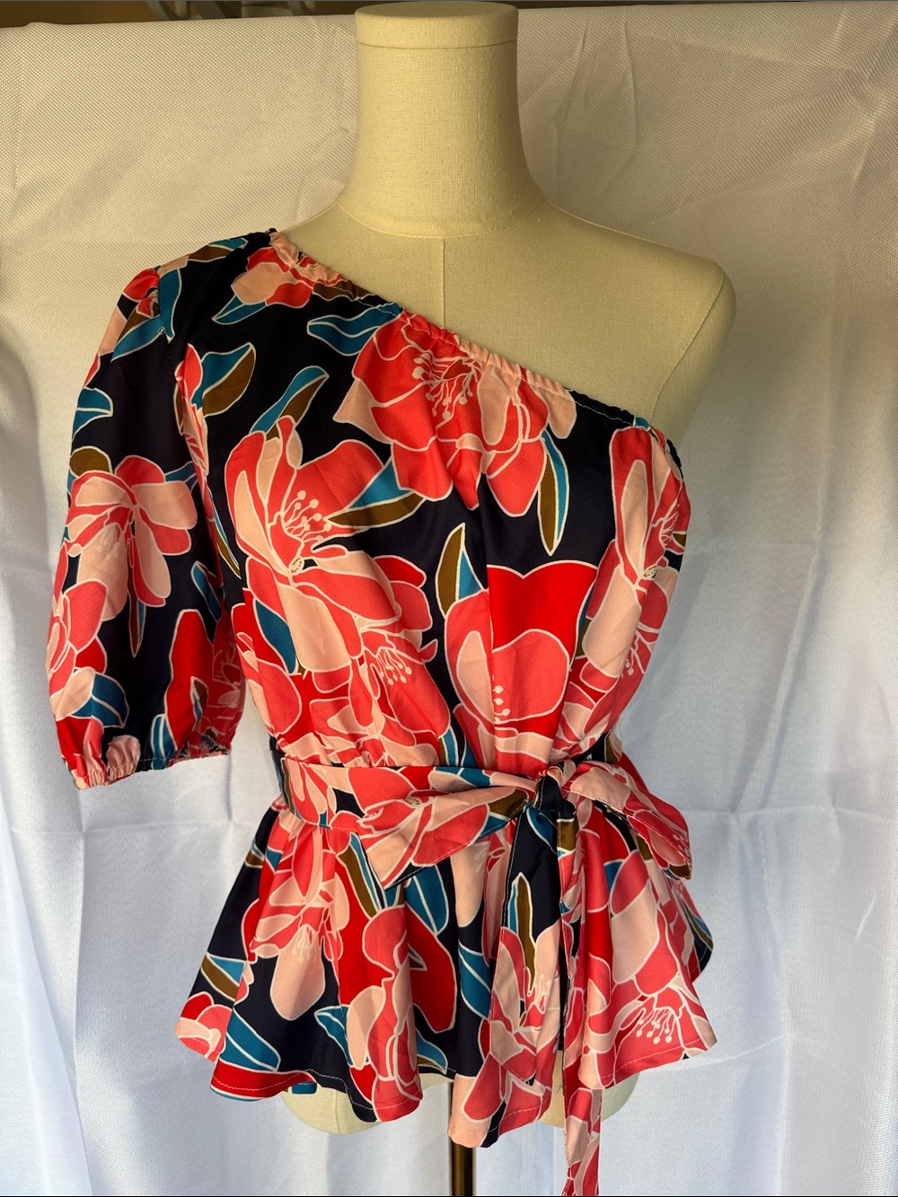 SHEIN One-Shoulder Floral Peplum Top in Black, Red, Pink and Teal